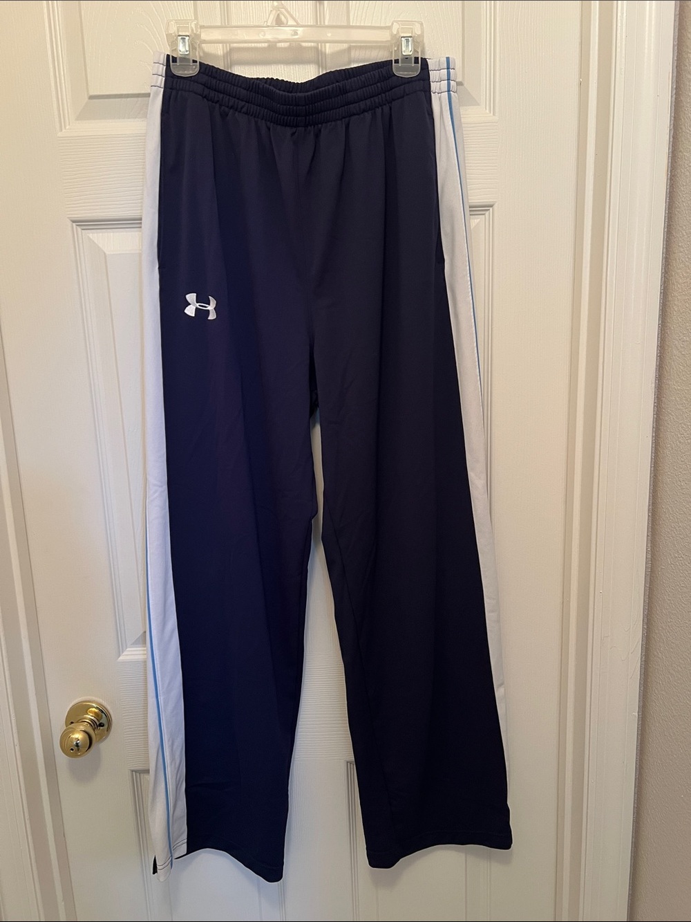 Under Armour Navy Track Pants with White Side Panels and Logo